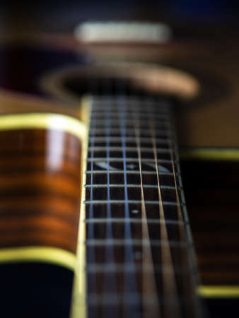 six - string acoustic guitar on a black background. low key. music dayの写真素材
