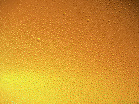 Water droplets on the glass with a colored background. Drops of water.の写真素材