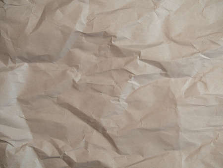 Crumpled wrinkled wrapping paper with abstract texture. Empty blank. photoの写真素材