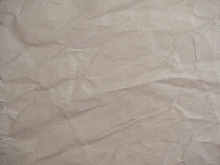 Crumpled wrinkled wrapping paper with abstract texture. Empty blank. photoの写真素材