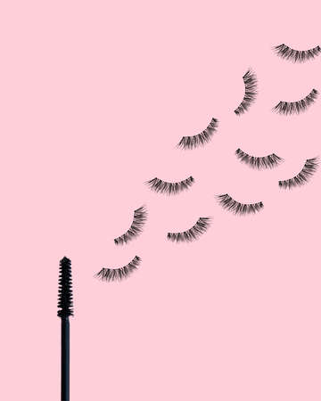 Fake eyelashes on pastel pink background. beauty concept. makeup cosmetics. Top view, flat lay. Layout. Place for text and design. web banner. Minimal styleの写真素材