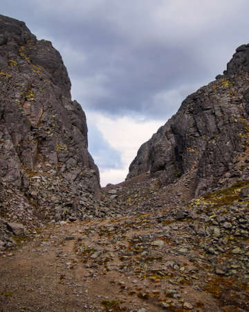 Gray lifeless rocky pass in the mountains. Khibiny, Russia.の写真素材