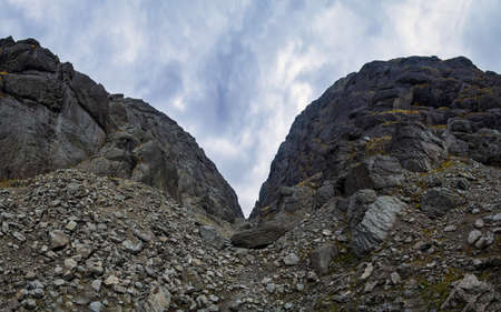 Gray lifeless rocky pass in the mountains. Khibiny, Russia.の写真素材