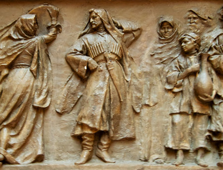 Engaged in a vibrant celebration, figures in traditional costumes express joy and unity.の写真素材