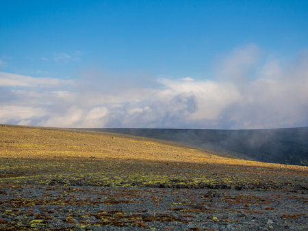 A chain of gray mountains in the backlight. Khibiny. photoの写真素材
