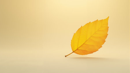 A vibrant yellow leaf gently floats through the air, illuminated by warm autumn light. The tranquil backdrop emphasizes the beauty of nature's shifting seasons and quiet moments.の素材