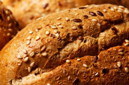 bun, sprinkled with sesame seeds, close upの写真素材