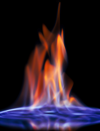 the flame of alcohol on the black backgroundの写真素材