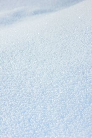 solid white blanket of snow on the groundの写真素材