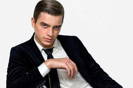 handsome young boy in a business suit Portrait Studioの写真素材