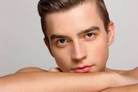 young man model beautiful skin portrait studioの写真素材