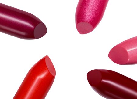 different color lipstick on a white background close-upの写真素材