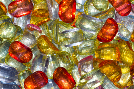colorful shiny beads scattered on the backgroundの写真素材