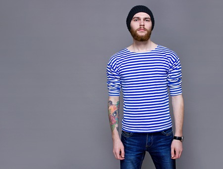 Young Male Model in striped T-shirt hipsterの写真素材