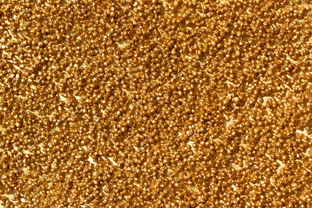 image filled with small gold stonesの写真素材