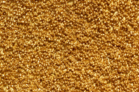 image filled with small gold stonesの写真素材