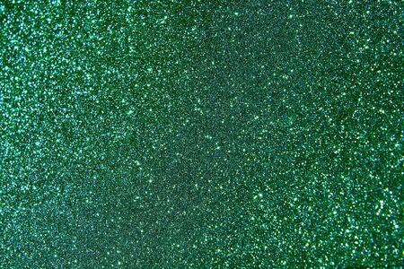 green glitter shimmering textureの写真素材