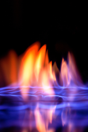 multi-colored flame of burning alcoholの写真素材