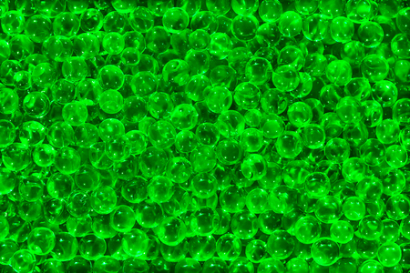 Green gelatin balls backgroundの写真素材