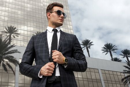Man on the background of a modern buildingの写真素材