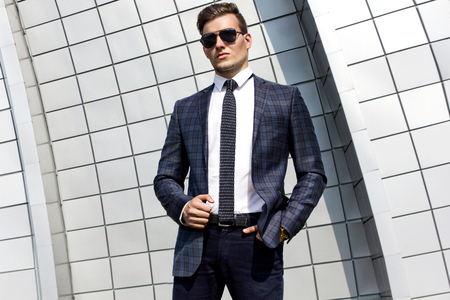 fashionably dressed man in the backgroundの写真素材