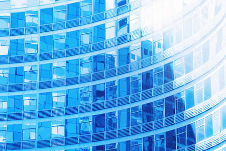glass wall of a skyscraper for design business background in your work.