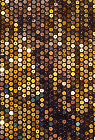 Fabric with sequins, turquoise and goldの写真素材