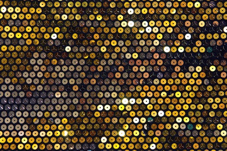 Gold and silver glittering fabric with sequins, copy spaceの写真素材