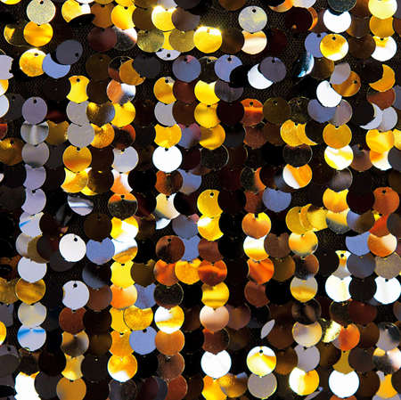 Multicolored sequins on fabricの写真素材