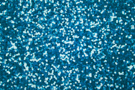 Sparkling blue sequin textile backgroundの写真素材