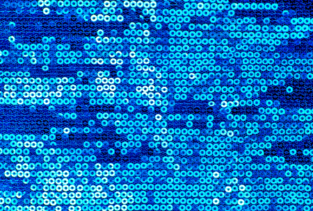 Sparkling blue sequin textile backgroundの写真素材