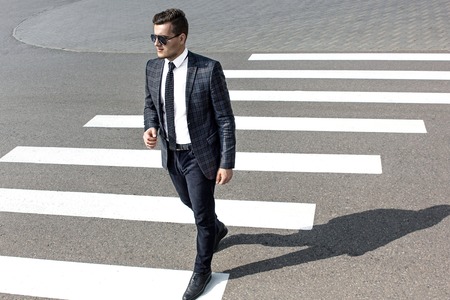 the man crosses the roadの写真素材