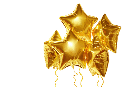festive golden stars balls on white backgroundの写真素材