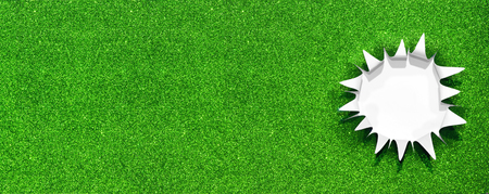 shiny green paper with a torn hole that looks like a starの写真素材