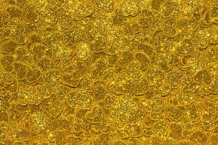 Golden shiny background with hearts. Luxury Valentine day, in Love concept. Hearts goldの写真素材