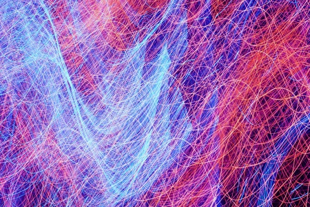 Modern abstract closeup of neon lines background on bla k background for digital wallpaper design....