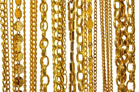 gold shiny chains on white background isolatedの写真素材