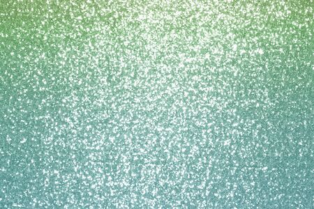 Sparkling pink, menthol, emerald, sequin textile background. Fashion fabric glitter, sequinsの写真素材