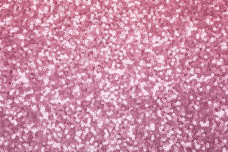 Sparkling pink, lilac sequin textile background. Fashion fabric glitter, sequinsの写真素材