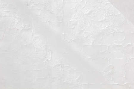 white plastered wall with shadow from structuresの写真素材