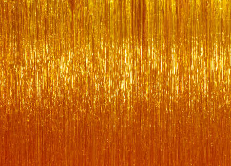 Bronze shimmer shiny golden Christmas lights backgroundの写真素材