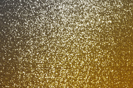Background sequin, sequin background. - Fashion fabric glitter sequins. Sequins on fabric in bright yellow and gray colors.の写真素材