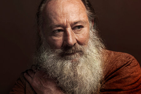 Senior man with long beardの写真素材