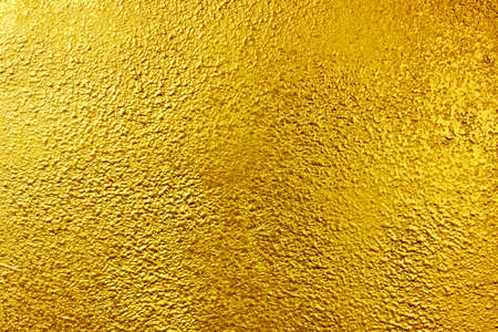 texture of golden background. Gold painted textureの写真素材