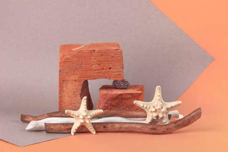 stone podium for a bottle or jar with cosmetics, cosmetics on a brick podium on a pastel background.の写真素材