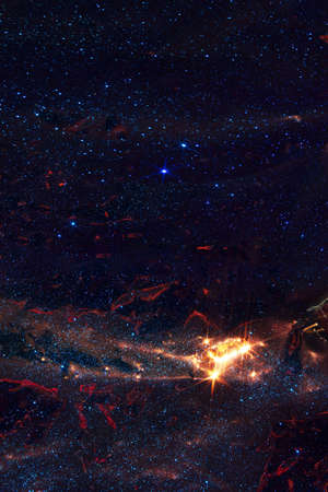 dark blue background with stars and stardust in the sky, dark background for your designの写真素材