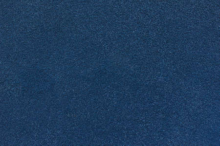 Abstract grunge dark blue background, fine grain structure, texturedの写真素材