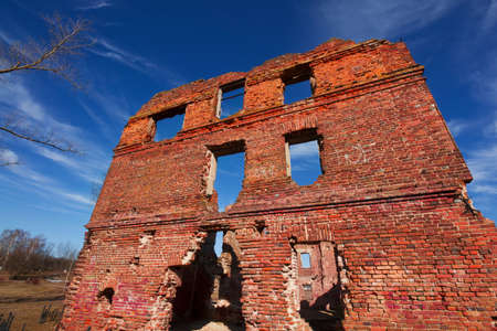 ruins of an ancient red brick building, ruins of a damaged and abandoned building.の写真素材