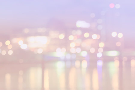 Abstract blurry sky and blurry city lights against the background of dawn with a circular light...