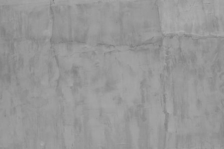 Texture, wall, concrete, plaster, it can be used as a background. Fragment of a wall with scratches and cracksの写真素材